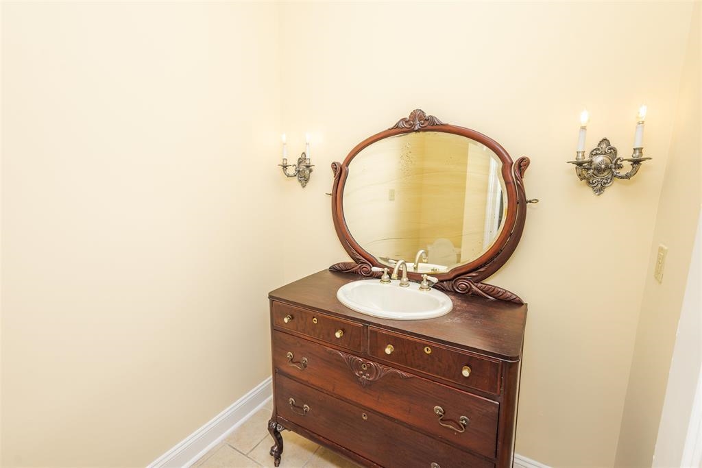 11111 Latting Road Eads, TN 38028 - Photo 19 of 40 a bathroom with a sink and a mirror