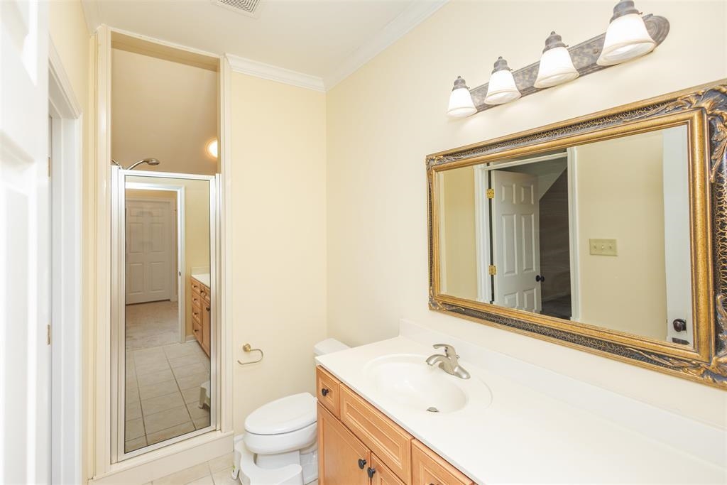 11111 Latting Road Eads, TN 38028 - Photo 20 of 40 a bathroom with a sink a toilet and shower