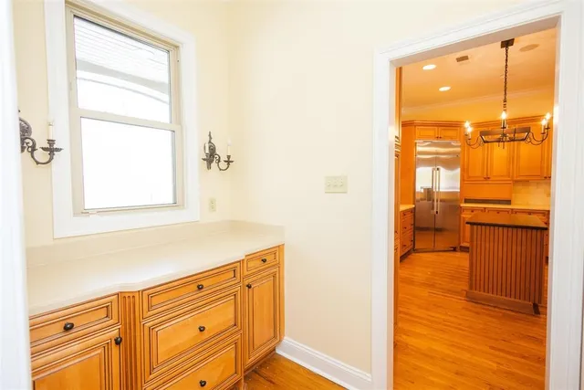 a hallway with a large window