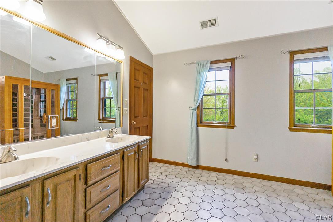 675 Bower Road Nazareth, PA 18064 - Photo 24 of 49 a bathroom with a sink double vanity and a mirror