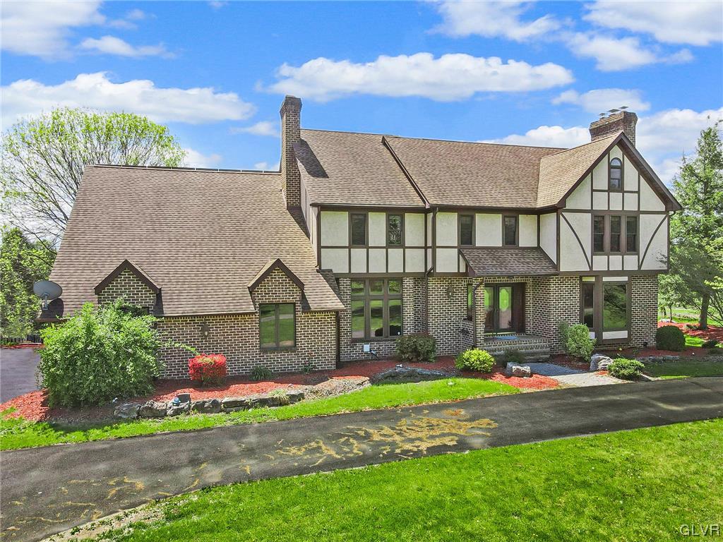 675 Bower Road Nazareth, PA 18064 - Photo 3 of 49 front view of a house with a yard