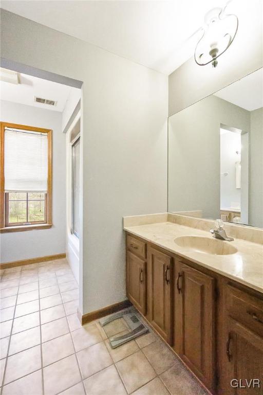 675 Bower Road Nazareth, PA 18064 - Photo 31 of 49 a bathroom with a granite countertop sink a mirror and a vanity