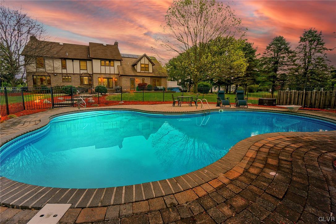 675 Bower Road Nazareth, PA 18064 - Photo 44 of 49 a view of a swimming pool with a chairs