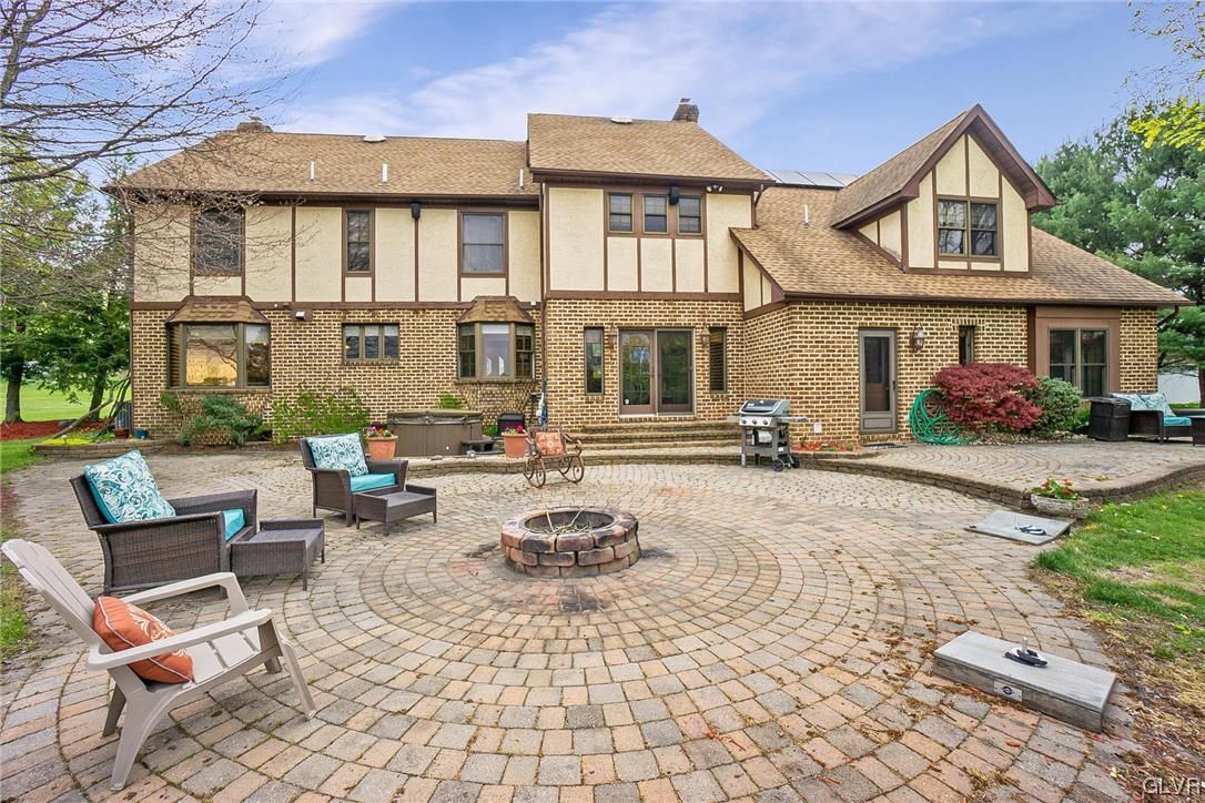 675 Bower Road Nazareth, PA 18064 - Photo 45 of 49 a front view of a house with swimming pool and furniture