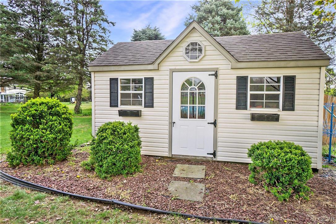 675 Bower Road Nazareth, PA 18064 - Photo 47 of 49 a front view of a house with garden
