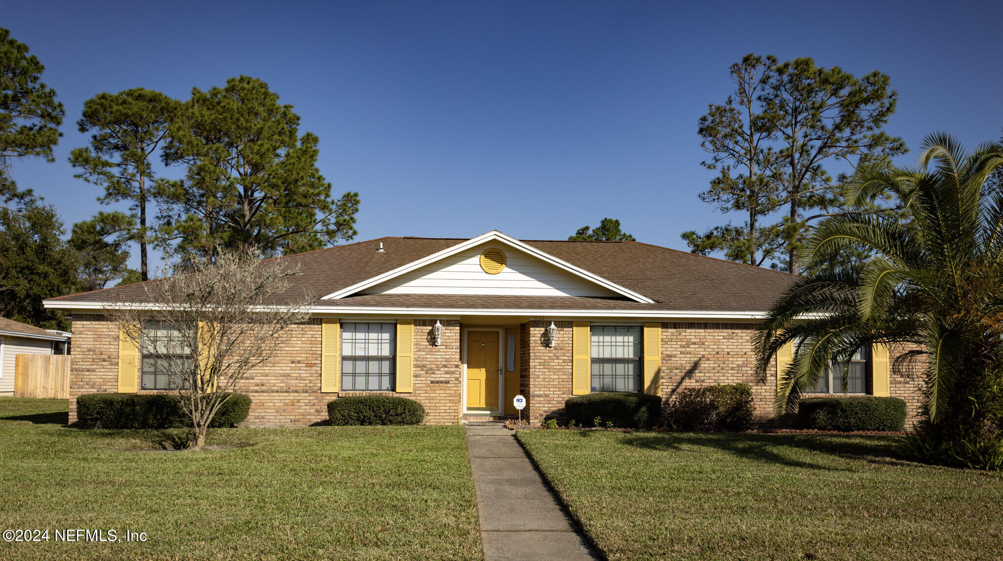 1662 Rusty Rail Road Jacksonville, FL 32225 - Photo 1 of 27 a front view of a house with a garden
