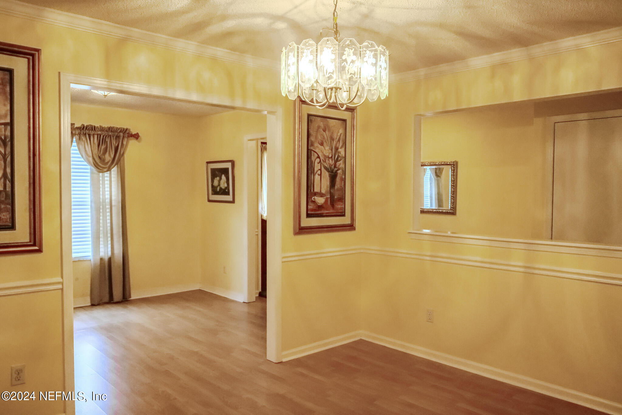1662 Rusty Rail Road Jacksonville, FL 32225 - Photo 11 of 27 a view of a room with wooden floor