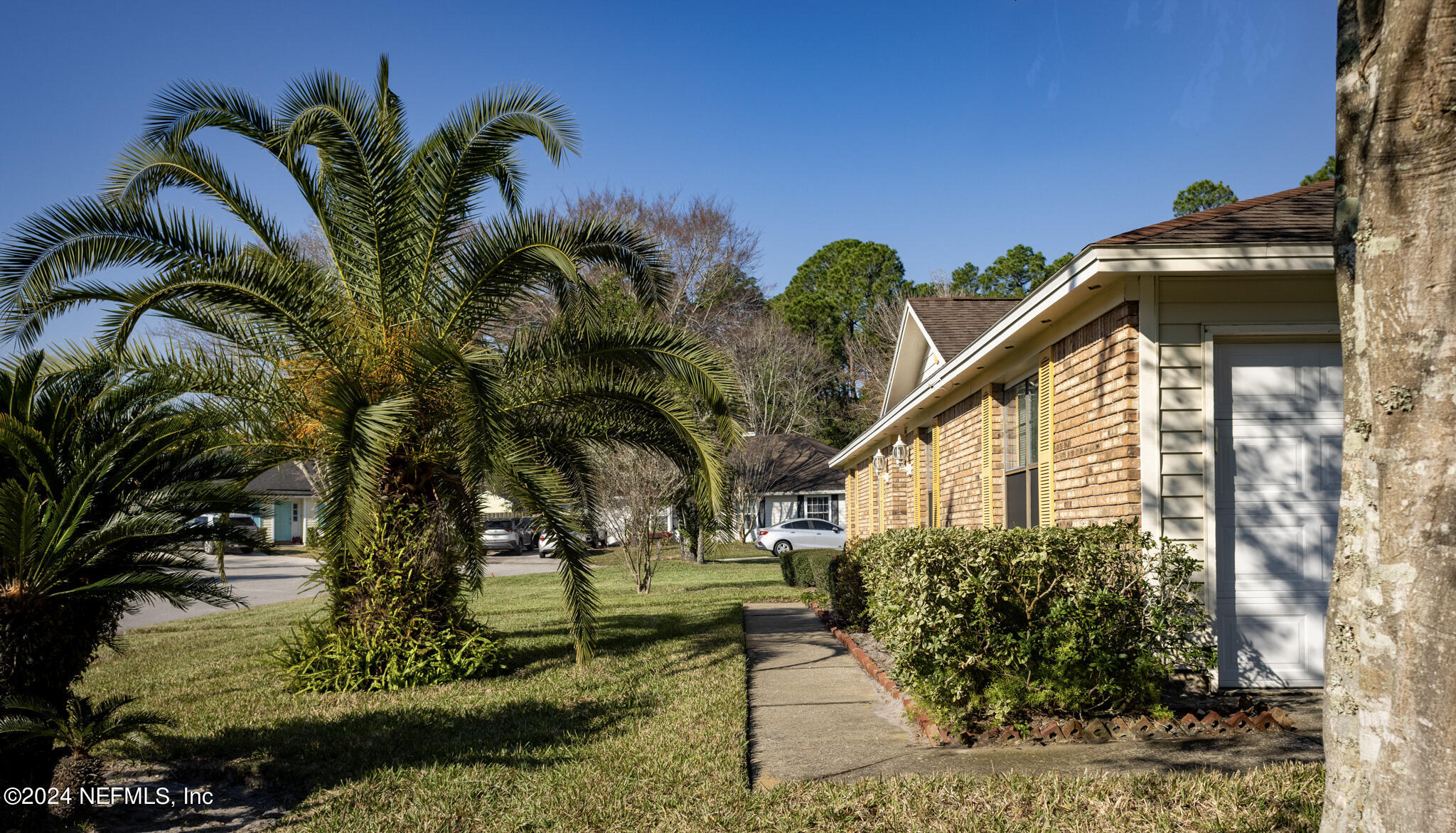 1662 Rusty Rail Road Jacksonville, FL 32225 - Photo 3 of 27 a view of a house with a flower garden