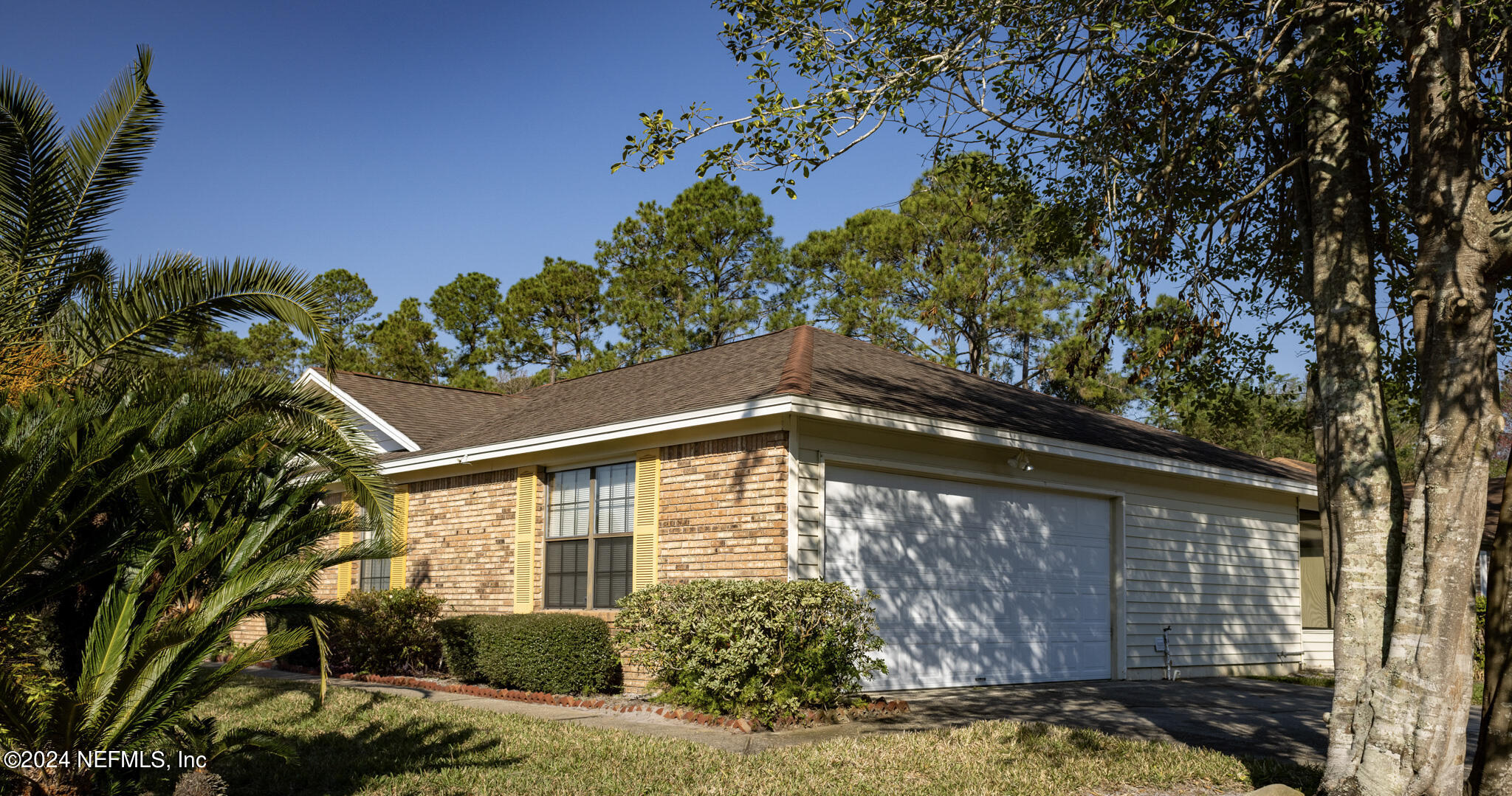 1662 Rusty Rail Road Jacksonville, FL 32225 - Photo 4 of 27 a front view of a house with garden