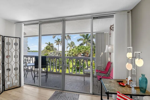 a room with lots of potted plants