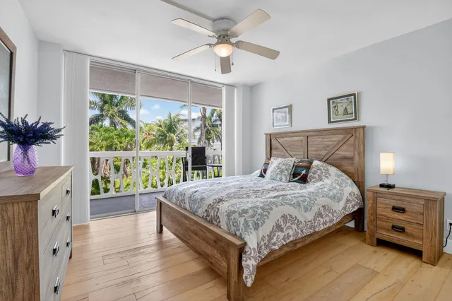 a bedroom with a bed and a tv