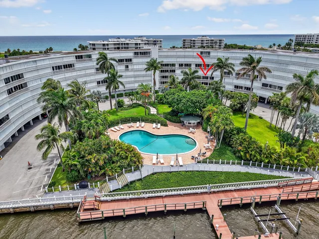 an outdoor space with furniture and umbrella