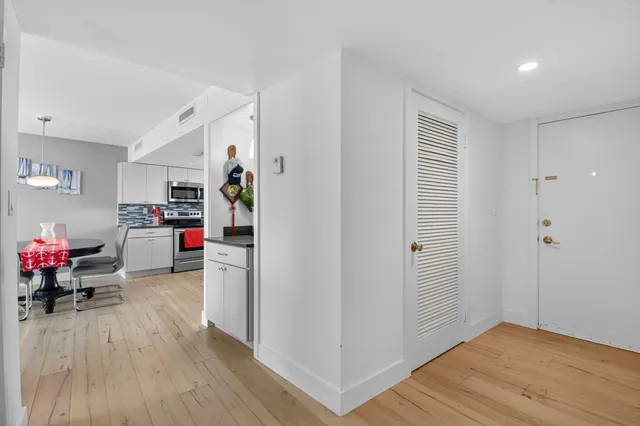 a room with furniture and a wooden floor