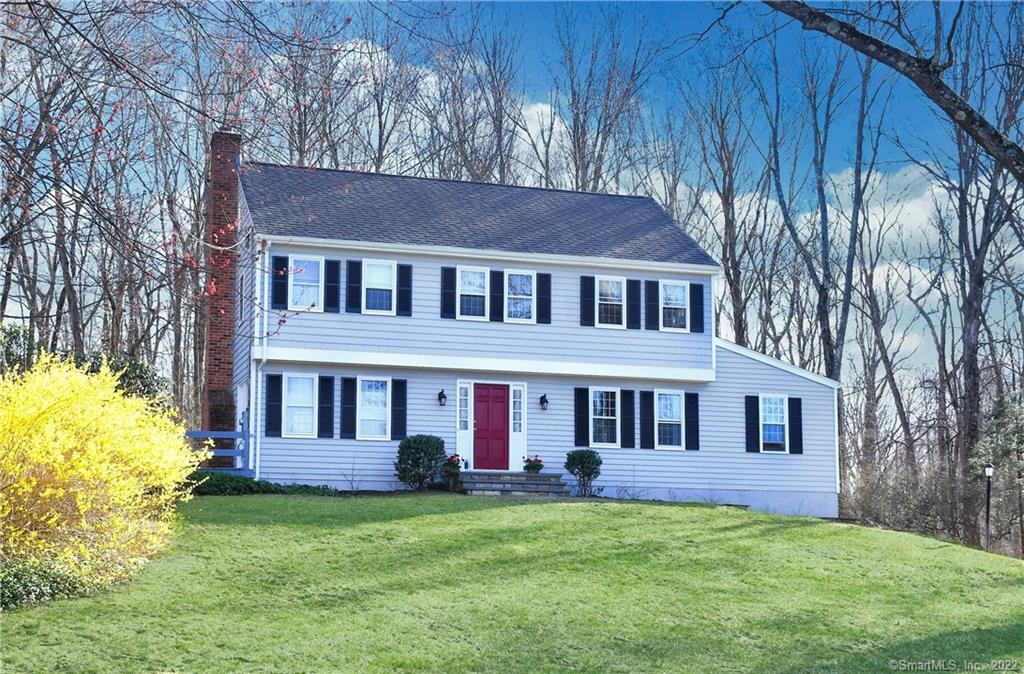 125 Standish Drive Ridgefield, CT 06877 - Photo 1 of 1 a front view of a house with garden