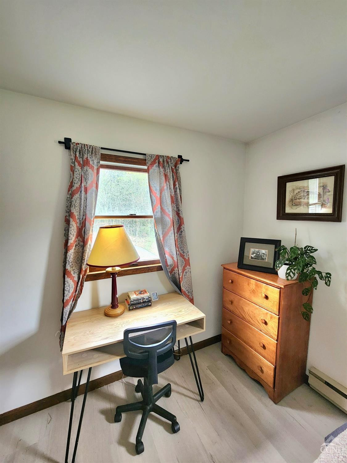 60 Burma Road Kinderhook, NY 12106 - Photo 19 of 43 a living room with furniture and paintings on wall