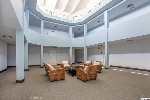 a room with furniture and a chandelier