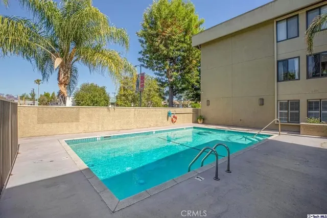 an outdoor space with lounge chair