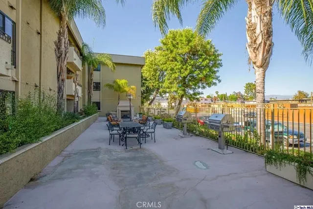 a view of a street with sitting area