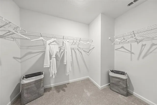 a view of a room with racks on the wall