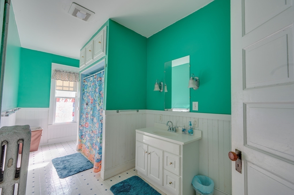 23 Germain Street Worcester, MA 01602 - Photo 20 of 42 a bathroom with a sink and a mirror