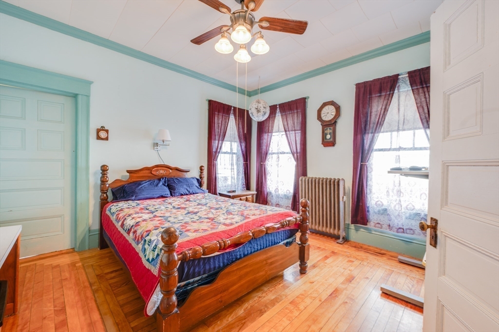 23 Germain Street Worcester, MA 01602 - Photo 23 of 42 a bedroom with a bed and a window