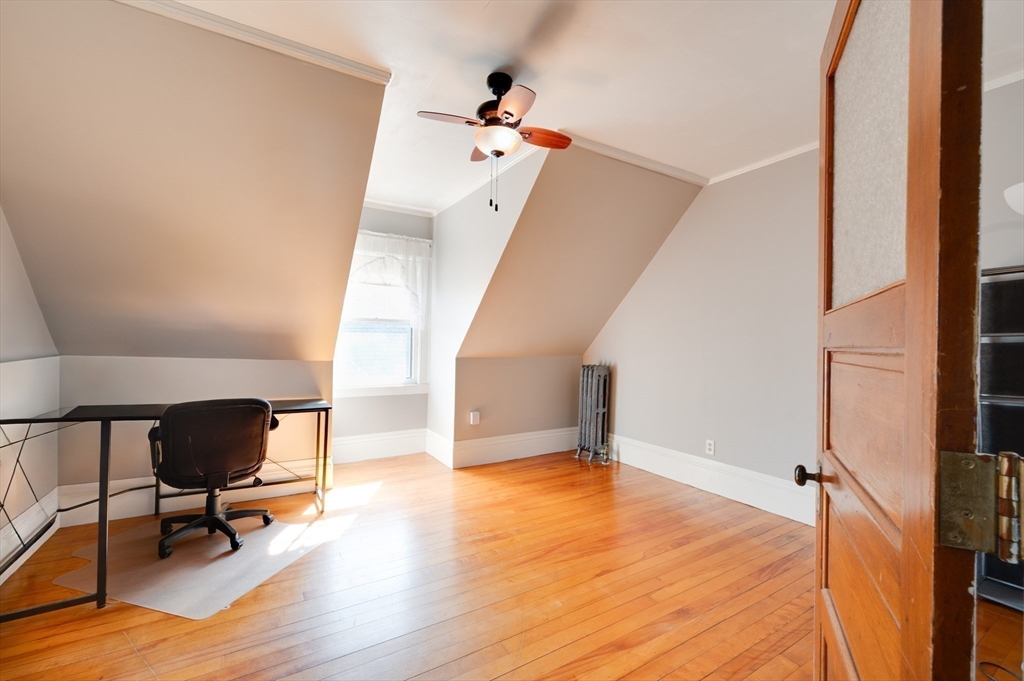 23 Germain Street Worcester, MA 01602 - Photo 30 of 42 a view of livingroom with hardwood floor and workspace