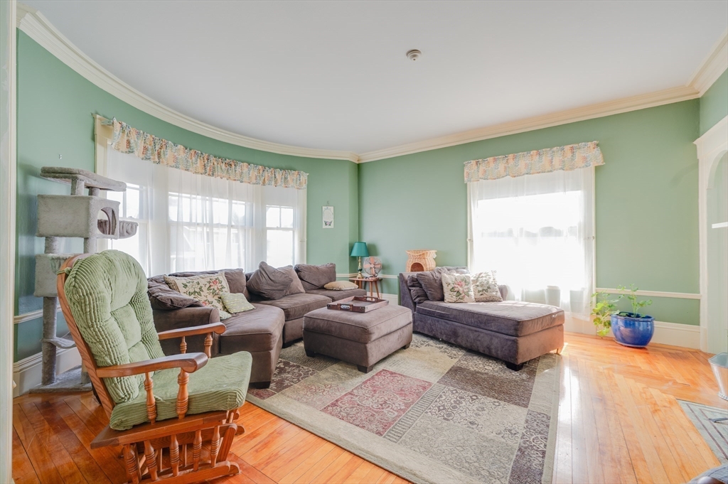 23 Germain Street Worcester, MA 01602 - Photo 6 of 42 a living room with furniture and a window
