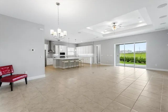 a view of an empty room with a fireplace