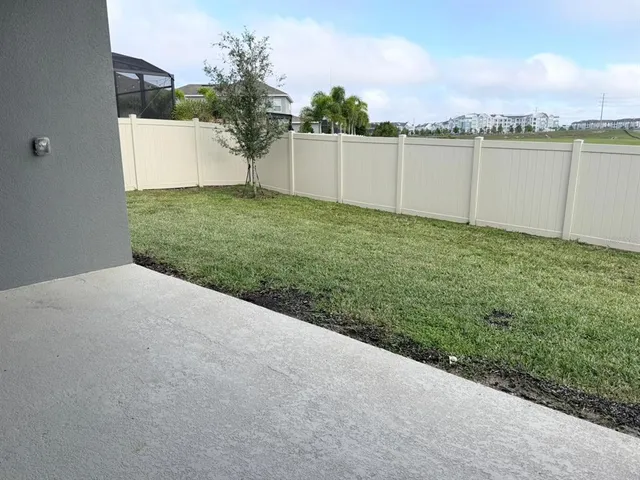 a view of an empty room with glass door