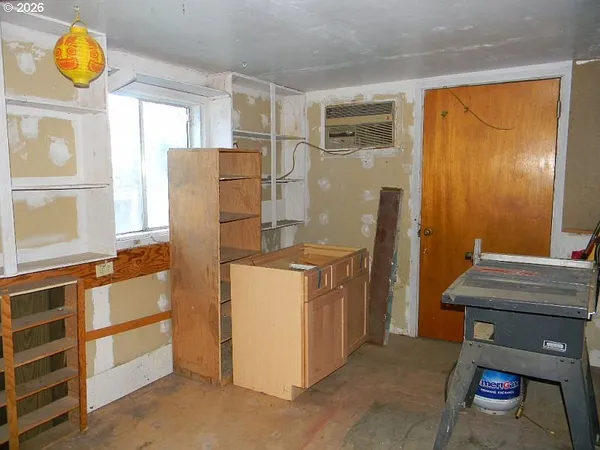 a view of walk in closet with window