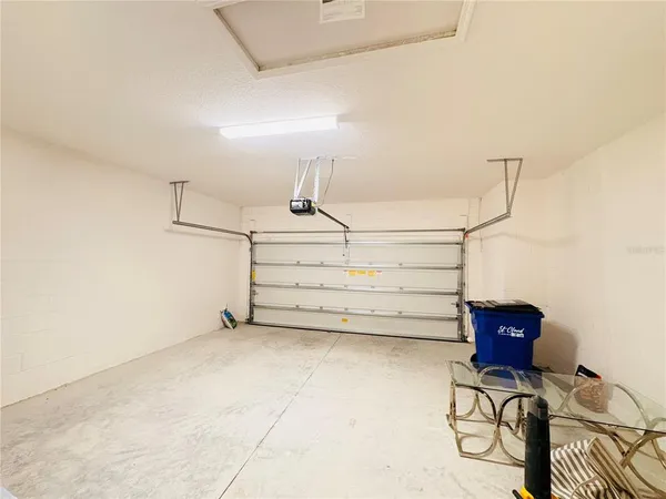 a view of room with stairs and a window