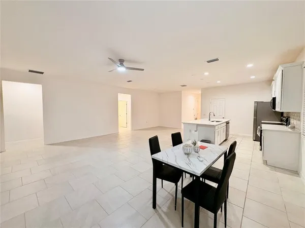 a view of a dining room with furniture