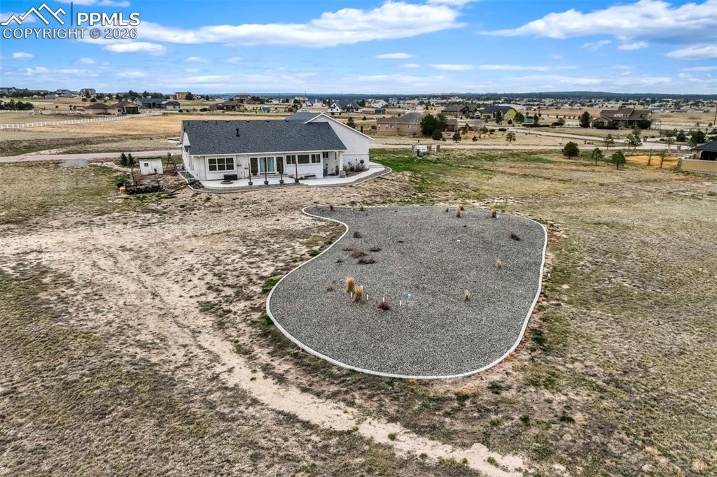12095 Silver Concho Trail Elbert, CO 80106 - Photo 36 of 38 an aerial view of a house with a ocean view