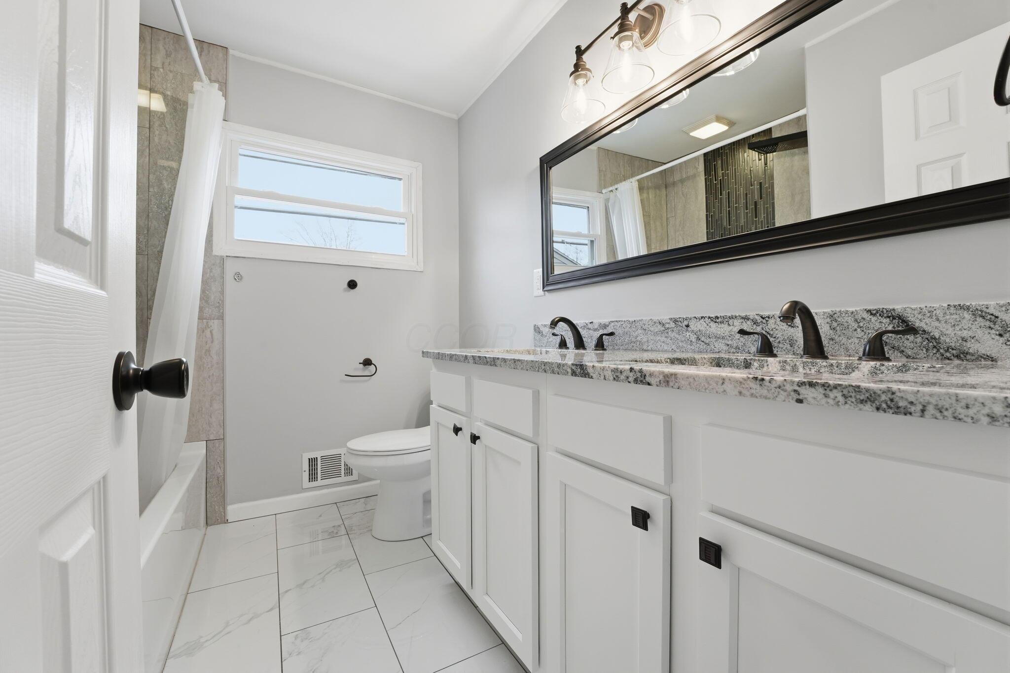 1260 Country Club Road Columbus, OH 43227 - Photo 20 of 28 Lower Bathroom