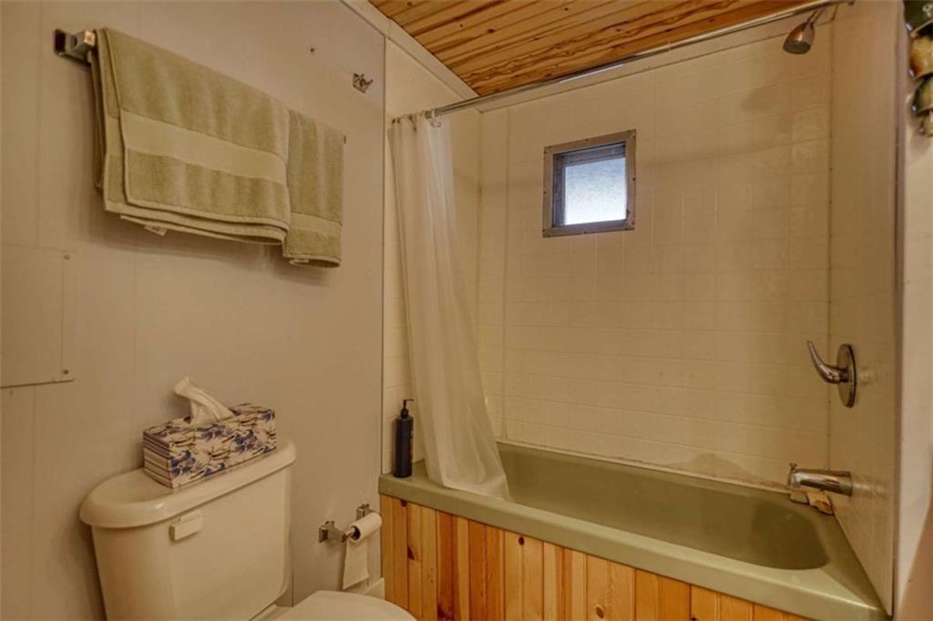 123 Copper Lane Mansfield, GA 30055 - Photo 27 of 43 a bathroom with a sink a toilet and shower