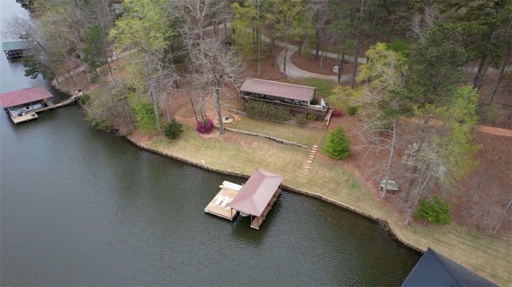 123 Copper Lane Mansfield, GA 30055 - Photo 35 of 43 an aerial view of a house with a yard and lake view