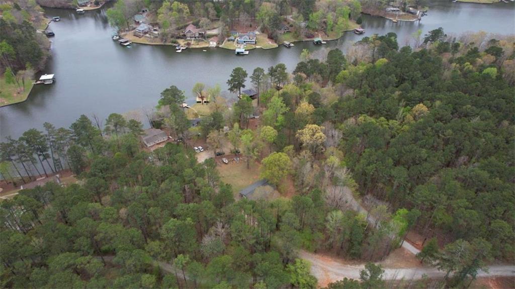 123 Copper Lane Mansfield, GA 30055 - Photo 38 of 43 an aerial view of a houses with a lake view