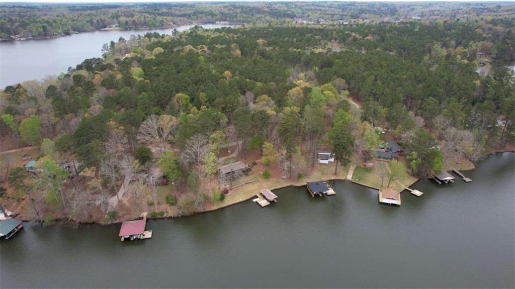 123 Copper Lane Mansfield, GA 30055 - Photo 41 of 43 an aerial view of a houses with a lake view