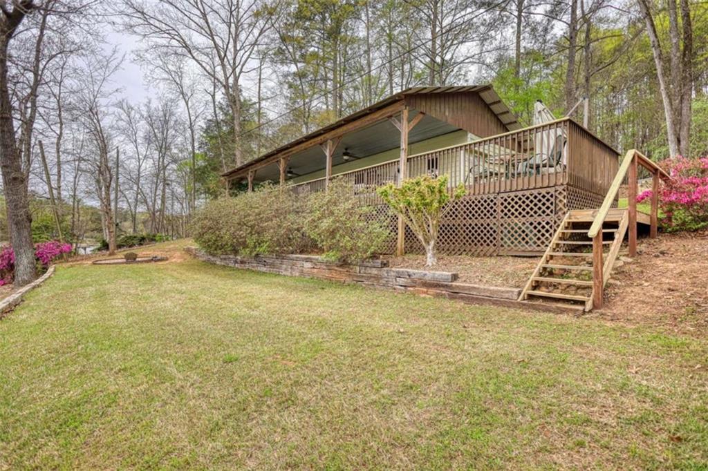 123 Copper Lane Mansfield, GA 30055 - Photo 7 of 43 a house with trees in front of it