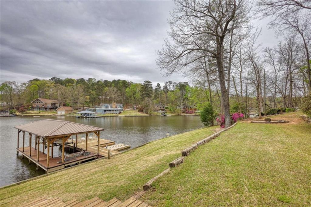 123 Copper Lane Mansfield, GA 30055 - Photo 8 of 43 a view of a lake with a mountain