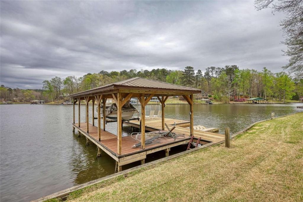 123 Copper Lane Mansfield, GA 30055 - Photo 9 of 43 a view of a lake with a mountain in the background