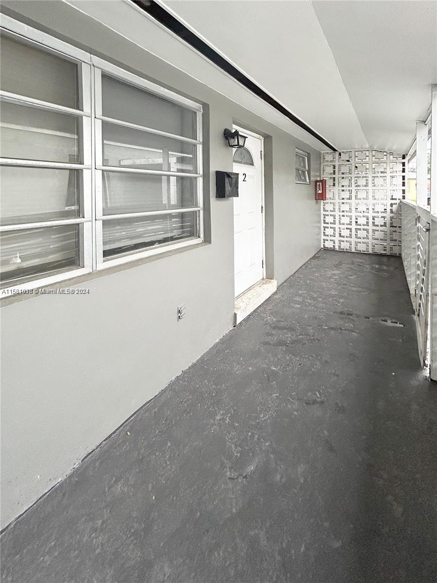 699 Northeast 86th Street, Unit 2 Miami, FL 33138 - Photo 12 of 12 a view of empty room with windows