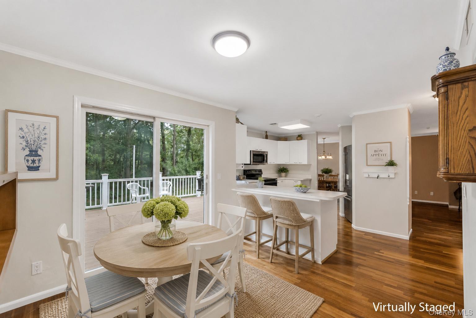 22 Kettle Hole Road Manorville, NY 11949 - Photo 15 of 39 The dining area in the kitchen has full walk-in pantry. A peninsula that provides area to eat in the kitchen hardwood floors throughout.