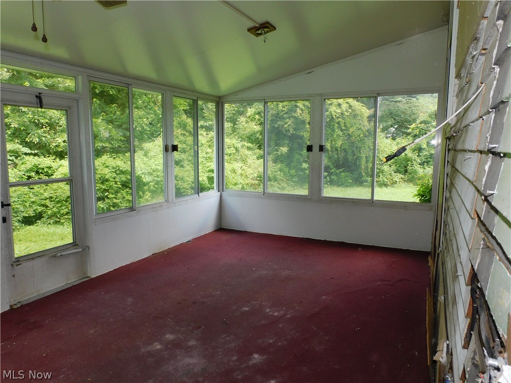 4031 South Ridge Road East Ashtabula, OH 44004 - Photo 20 of 25 Unfurnished sunroom view A