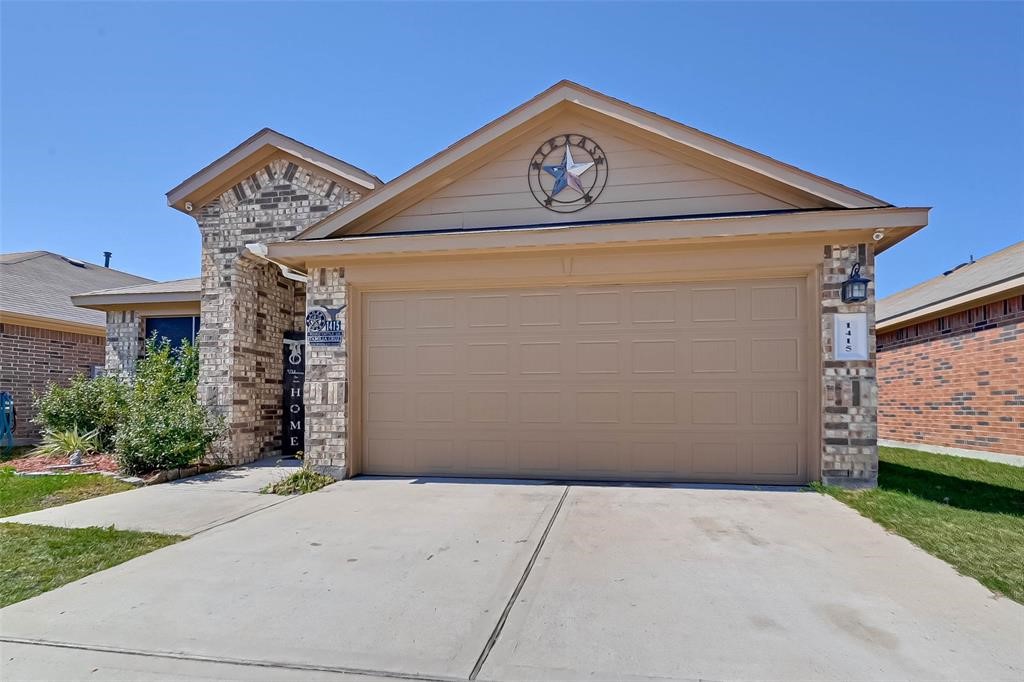 1415 Rodeo Cattle Lane Houston, TX 77049 - Photo 1 of 18 a view of a house with a yard