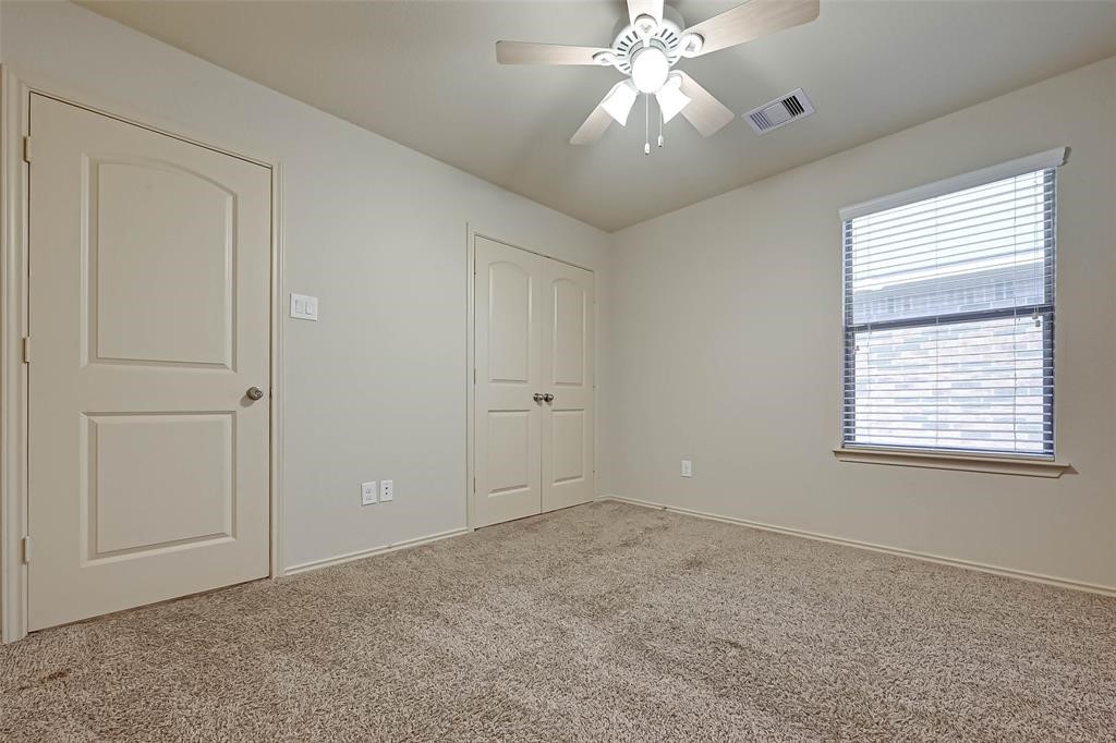 1415 Rodeo Cattle Lane Houston, TX 77049 - Photo 18 of 18 a view of an empty room with a window