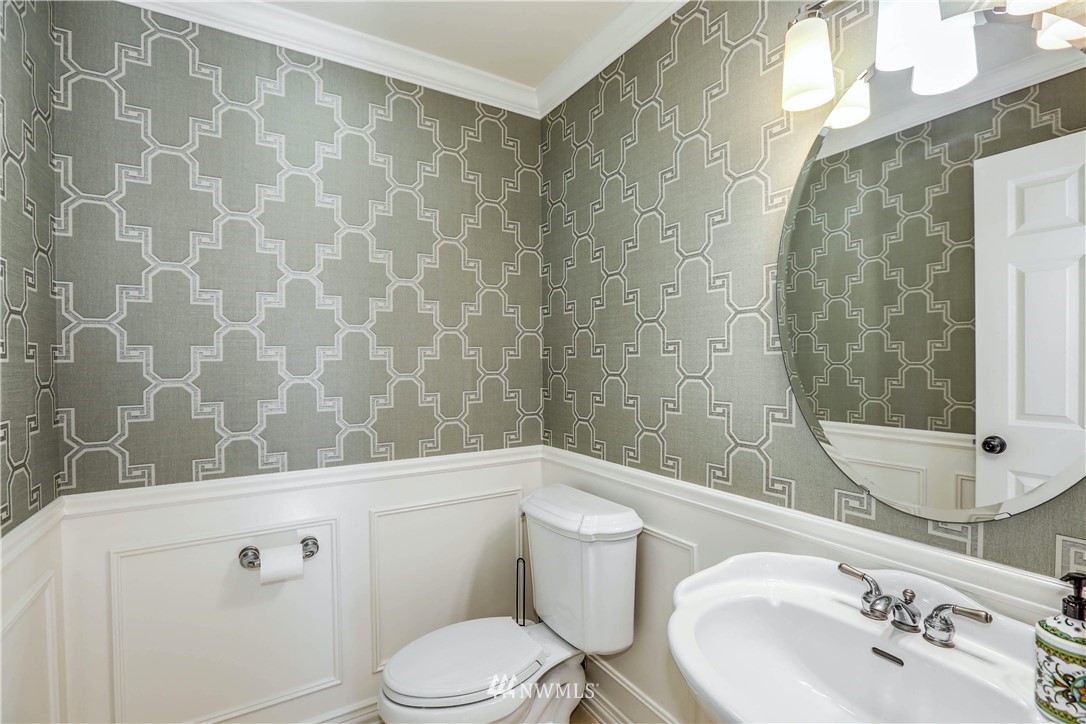 17124 Southeast 100th Street Renton, WA 98059 - Photo 14 of 40 a bathroom with a sink a toilet and shower