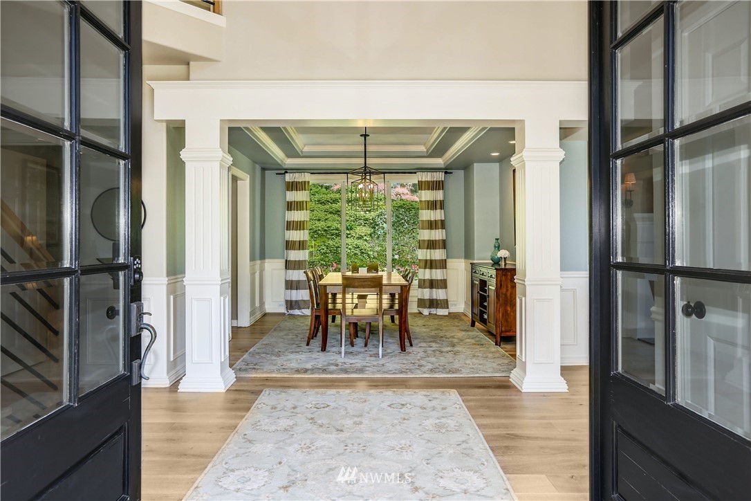 17124 Southeast 100th Street Renton, WA 98059 - Photo 3 of 40 a view of a living room with a furniture and floor to ceiling window