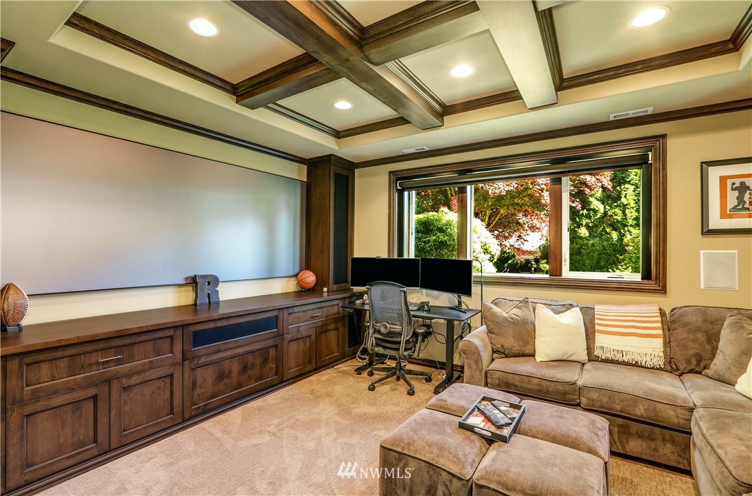 17124 Southeast 100th Street Renton, WA 98059 - Photo 28 of 40 a living room with furniture and large windows