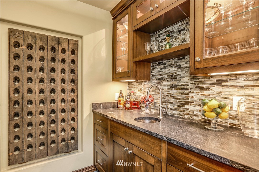 17124 Southeast 100th Street Renton, WA 98059 - Photo 30 of 40 a bathroom with a sink a vanity and a shower